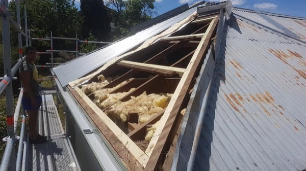 Roof restoration in progress by Luke Taylor Plumbing