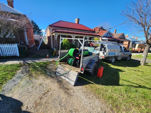 Luke Taylor Plumbing's water jetting trailer and ute set up on a job in Bathurst